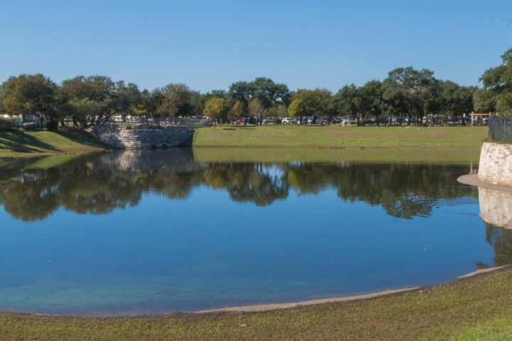 Large communal pond in a public park - aquatic maintenance by Sorko Services in Central Florida
