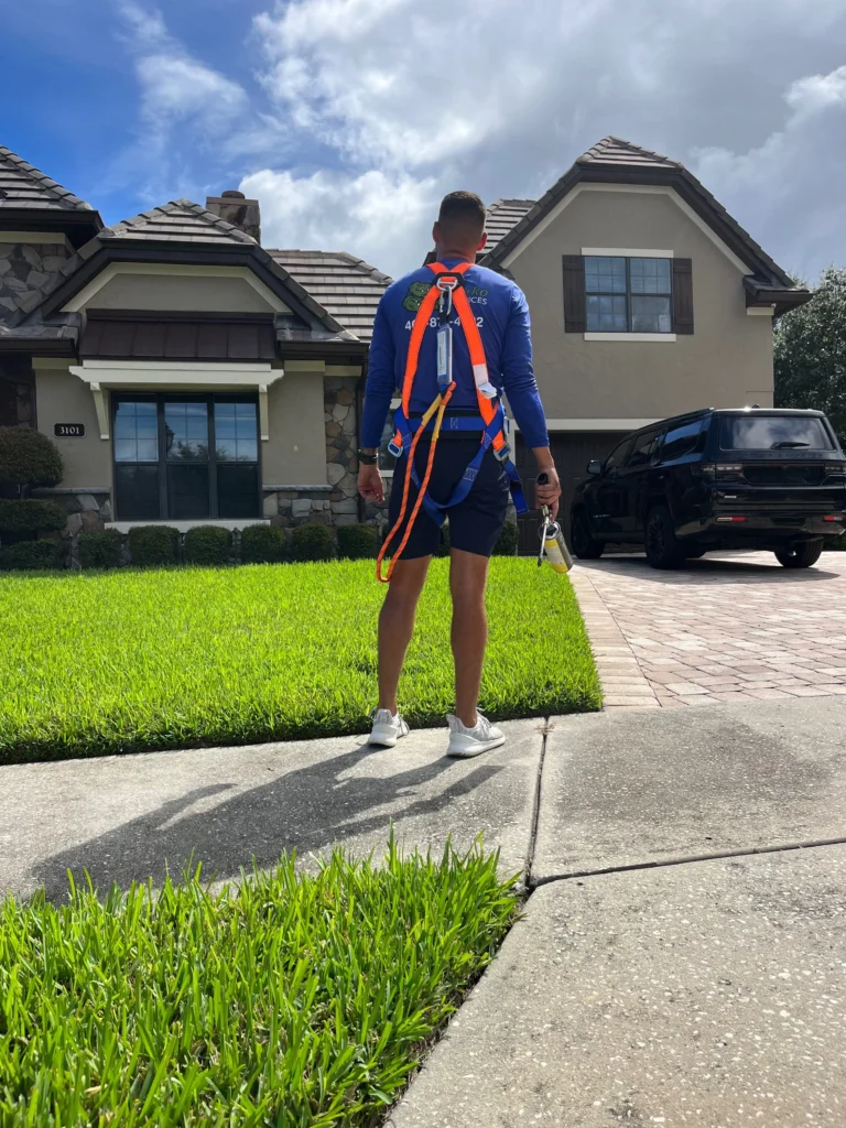 A Sorko Services worker wearing PPE about to complete attic exclusion work.